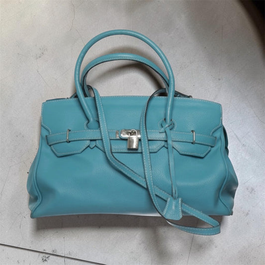 Teal firkin bag